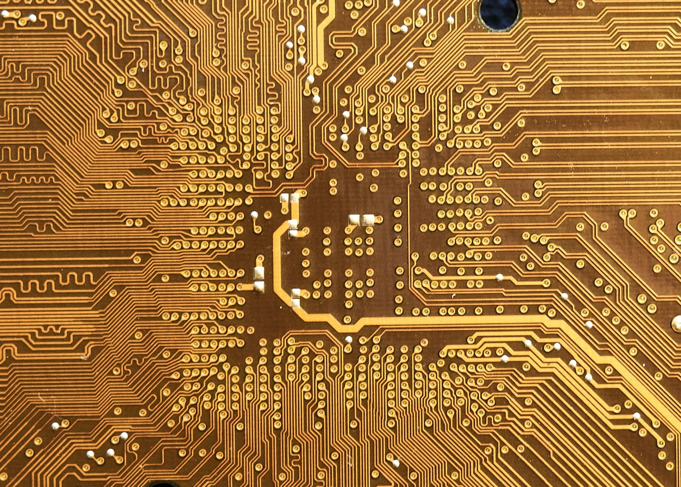 Macro view of a golden circuit board